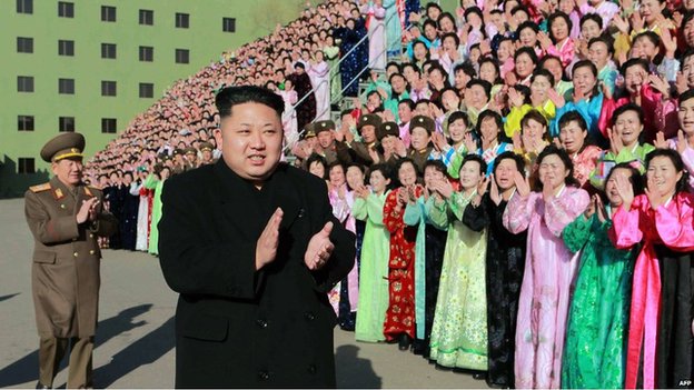 Kim Jong-Un with North Korean soldiers' families